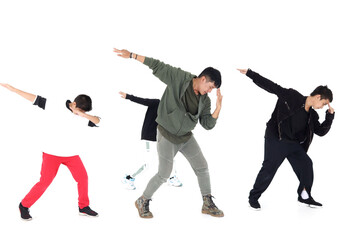 Obraz premium Group of happy kids studying modern style dance in indoor studio classroom with their teacher, children and adult dancing white background.