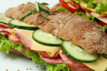 Concept of tasty eating with ciabatta sandwiches, close up