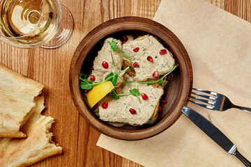 Georgian style fried fish with walnut sauce, lemon and pomegranate