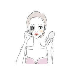 メイクする女性　ビューラー