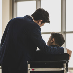 Businessmen working in modern workplace