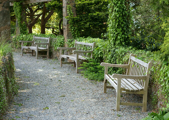 Wooden benches for rest.  Wave Hill in Hudson Hill of Riverdale in Bronx, New York City