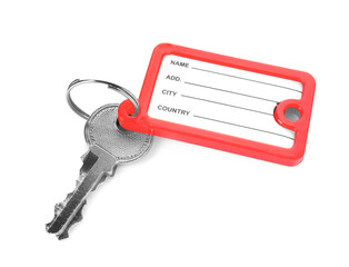 Key with plastic tag on white background