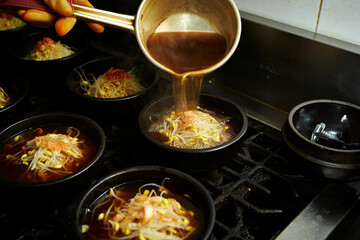 Add broth to boiling pot