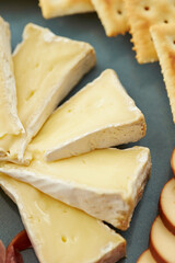 sliced cheese on a plate 