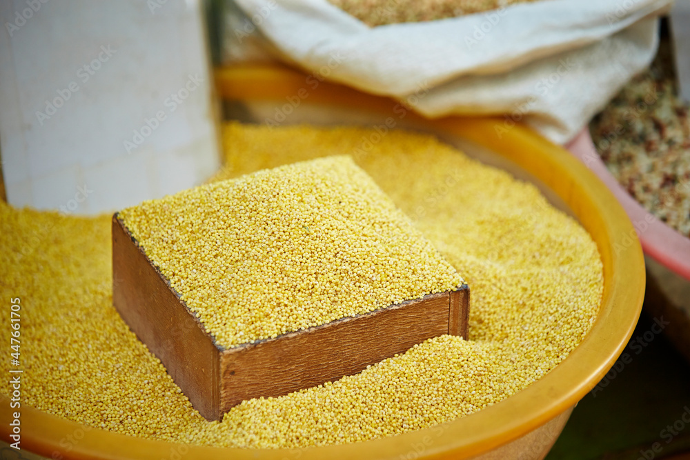 Canvas Prints Yellow grains displayed in a traditional market