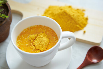 yellow powder in a cup