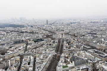 Aerial view of Arc de Triomphe, Paris and defense neighborhood.