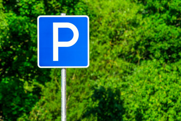 Parking sign on natural green background