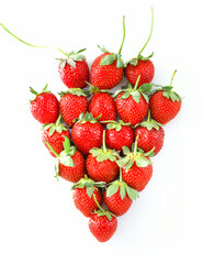 Ripe local produce organic strawberry, Heap of red berries. Fresh healthy vegan dietary food for spring detox. Fruits isolated on white background, top view, copy Space.