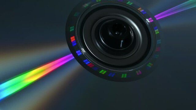 DVD disk rotating gleaming colorful rainbow