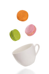 Colorful macaroons levitation on white background. Food levitation concepts.