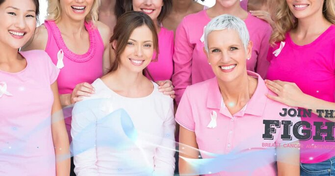 Animation of breast cancer text blue wave over diverse group of smiling women