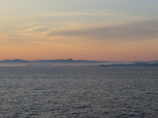 Sunrise over Corsica seen from the ferry