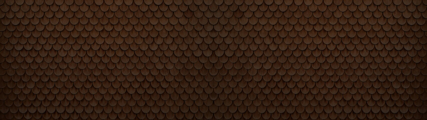 Traditional ecological  consistent cladding of a wall with dark brown wooden larch fish scales, wood shingles, clapboard, clapboard texture background banner panorama 3D scindula in Voralberg © Corri Seizinger