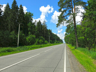 deserted asphalt highway in summer