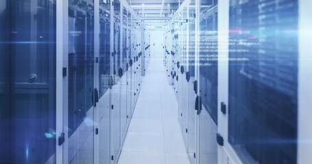 Computer servers in a server room with glowing lights