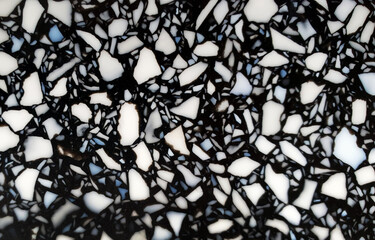 close up black and white terrazzo stone background. terrazzo flooring texture stone polished in...