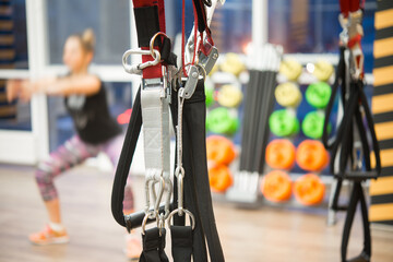 Training loops trx belts in the gym