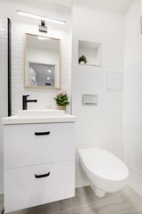 Jasna łazienka w komfortowym mieszkaniu - obrazy, fototapety, plakaty