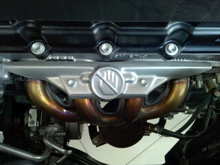 Header exhaust in car. Thermal insulation materials sheet.