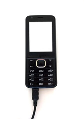 Mobile keypad phone. Isolated keypad phone on white.