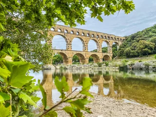 Papier Peint photo autocollant Pont du Gard Roman aqueduct seen through foliage, Pont-du-Gard, Languedoc-Roussillon France