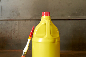 Close up of Paint Brush And bottle for removing color painting paint