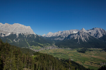 Fototapeta na wymiar Zugspitze mountain and Ehrwalder Sonnenspitze mountain in Tyrol, Austria