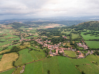 Naklejka premium Aerial view on Olloix, small french village , Puy-de-Dome, Auvergne-rhone-alpes