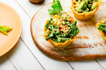Cheese basket filled with vegetables and nuts
