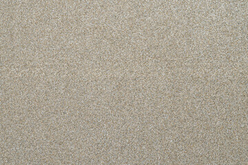 Fototapeta premium Wet sand surface texture at the beach.