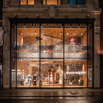 The Alexander McQueen fashion store, Bond Street, London. The extravagant  façade to the iconic fashion brand in London's exclusive shopping district.  Stock Photo | Adobe Stock