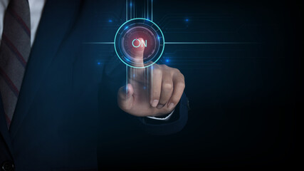 Fototapeta premium businessman touching screen, pushing on a touch screen power button. concept innovation.
