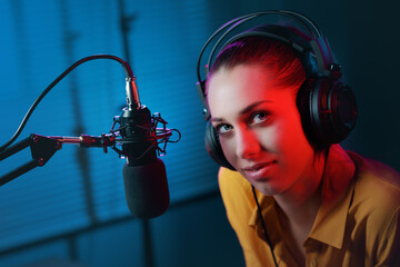 Charming radio host in the studio