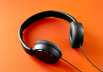 Headphones on a orange background