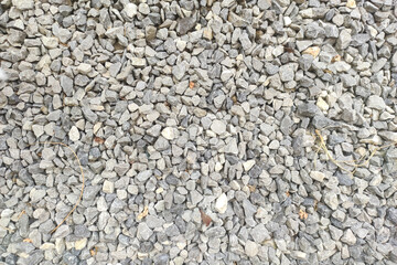 White crushed stones texture. Gravel pattern