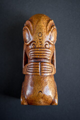 traditional wooden Polynesian tiki from Marquesas Islands