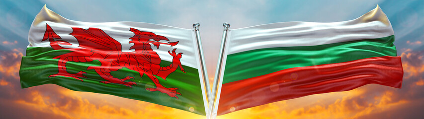 Wales Flag and Bulgaria flag waving with texture sky Cloud and sunset Double flag