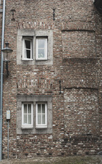 old European brick houses with white windows