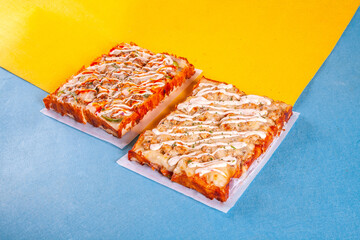 Detroit style deep pan pizza with cheese burnt crust