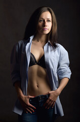 Portrait of beautiful sensual woman with blue eyes. Studio shot.