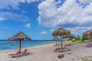 A beautiful beach with no one around. tropical tree shade