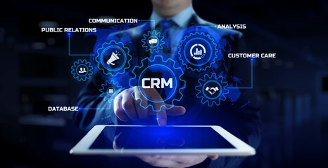 CRM Customer relationship management concept. Businessman pressing button on screen.