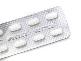 The white pills are on the panel.