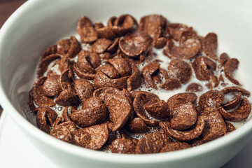 Closeup of Chocolate cereal with selective focus. Shallow depth field. Healthy food concept