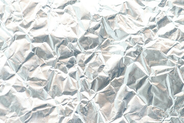 Crumpled metal foil texture background, aluminum foil texture