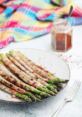Seasonal fresh asparagus fried with bacon