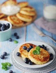 Cottage cheese pancakes - traditional Russian syrniki	