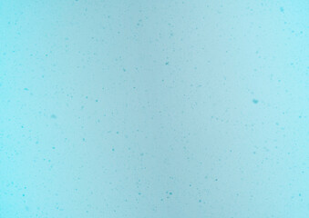 Blurred winter photo overlay. Empty space. Light background with fluffy flying snowflakes.